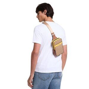 NEW Michael Kors Cooper Medium Signature PVC Sling Backpack Daisy Yellow & Brown
